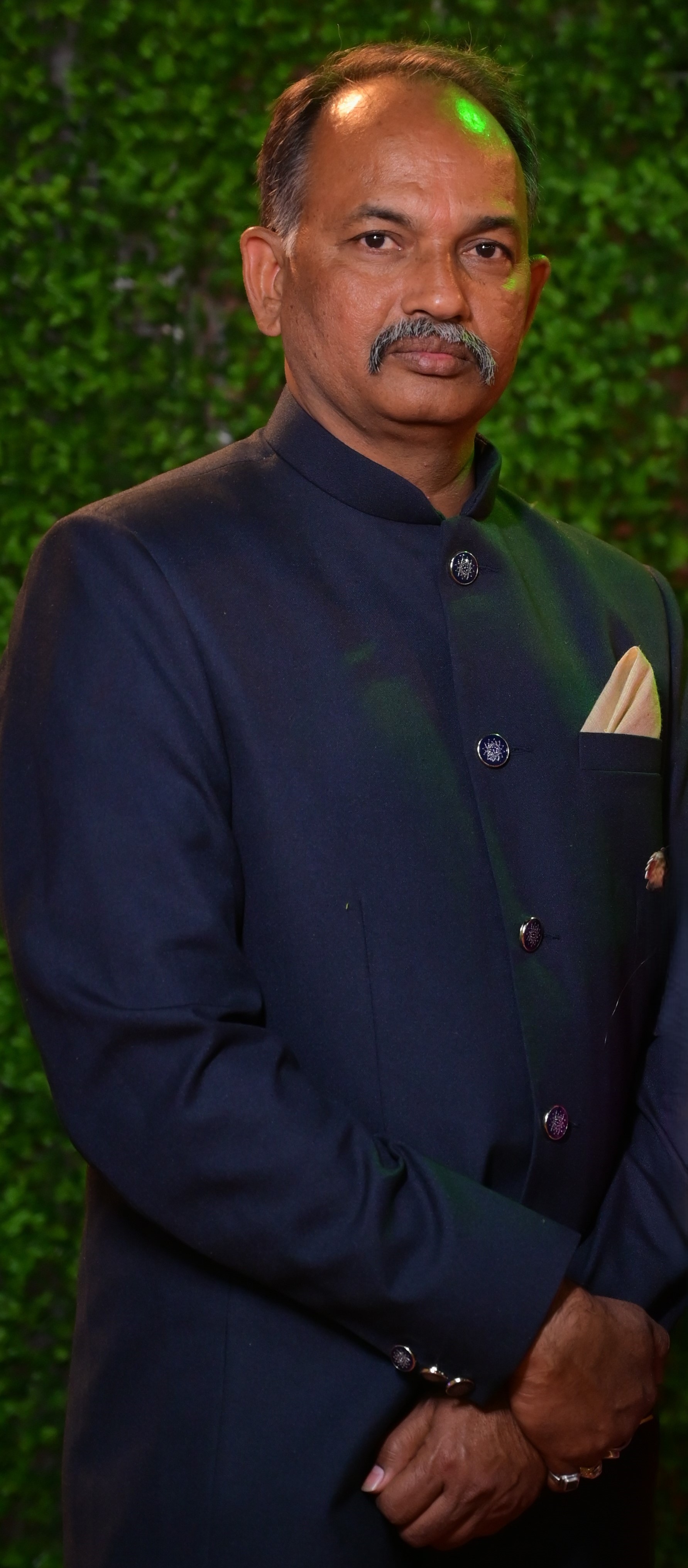 Pandit Prakash Bhai Joshi in a traditional attire